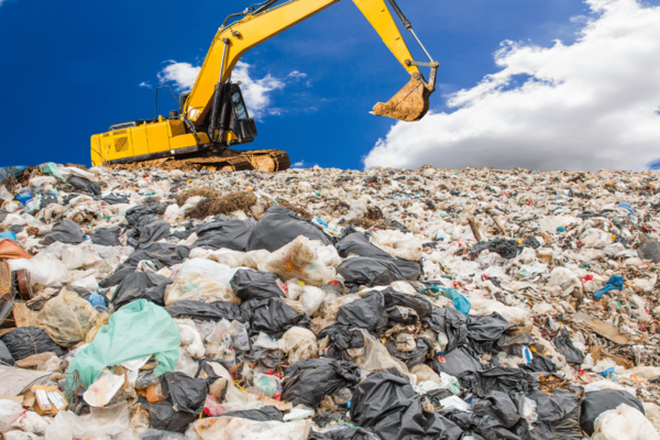 digger in a landfill site