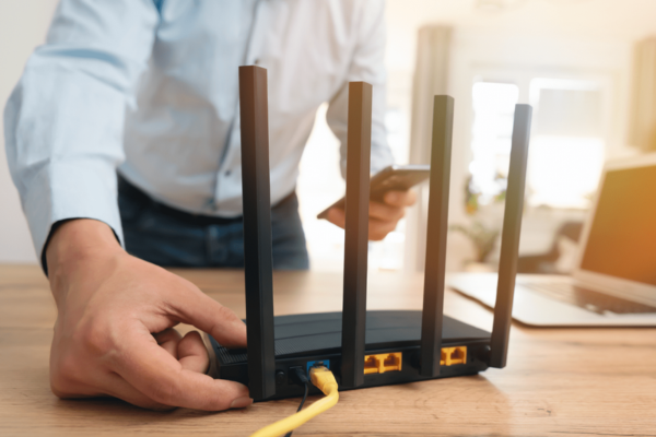 man and a wifi router
