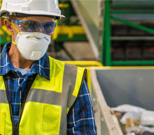 Man dressed in personal protective equipment