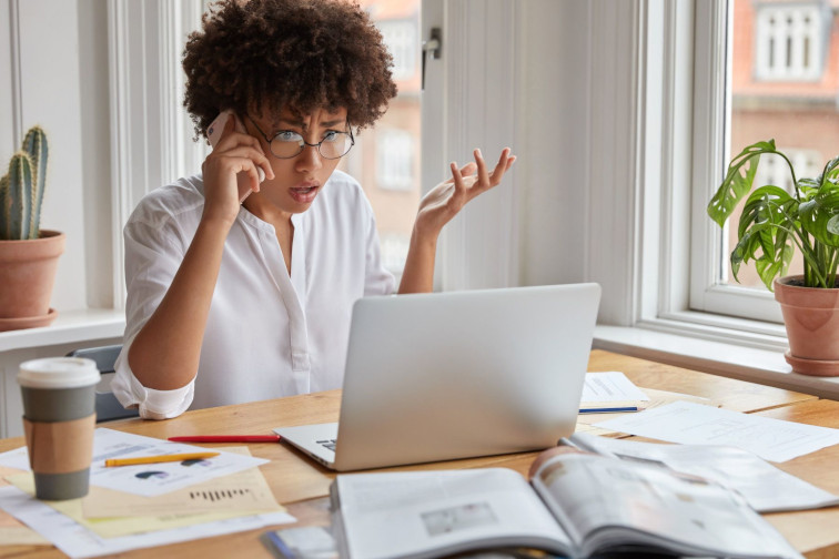 person confused sorting out their utility bills