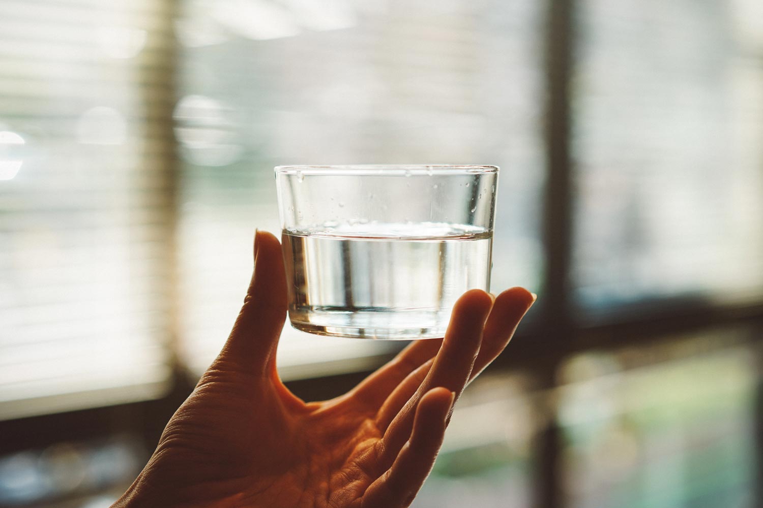 Glass of water in a business utilities office