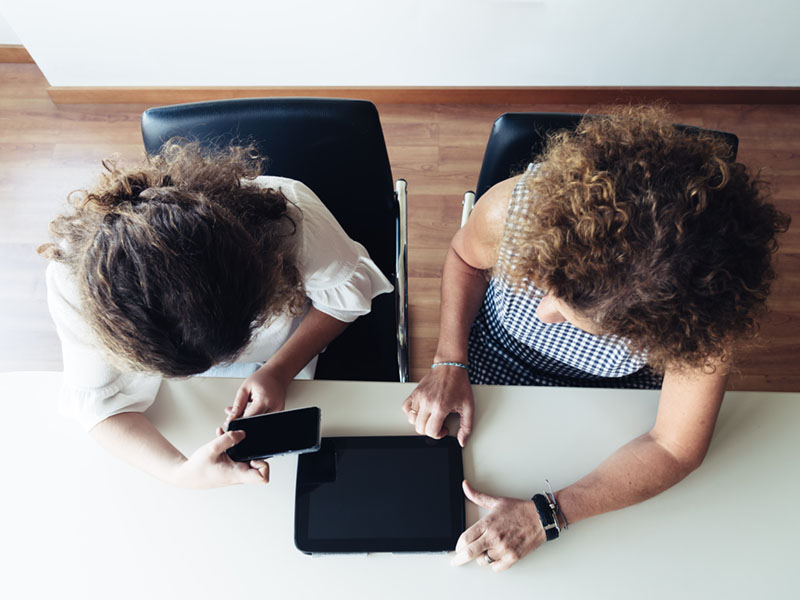 two people working